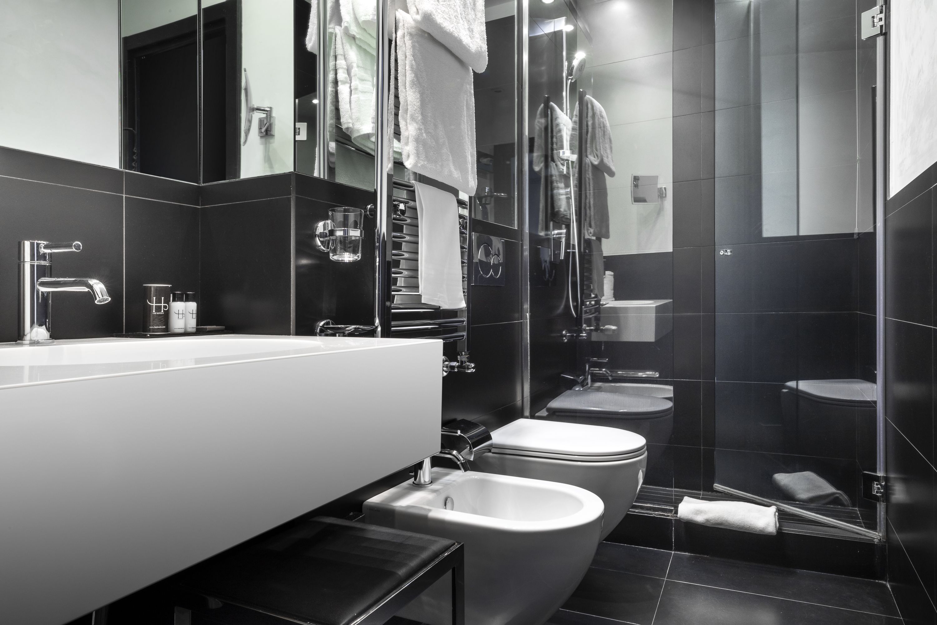 free toiletries, hair dryer, slippers, bidet