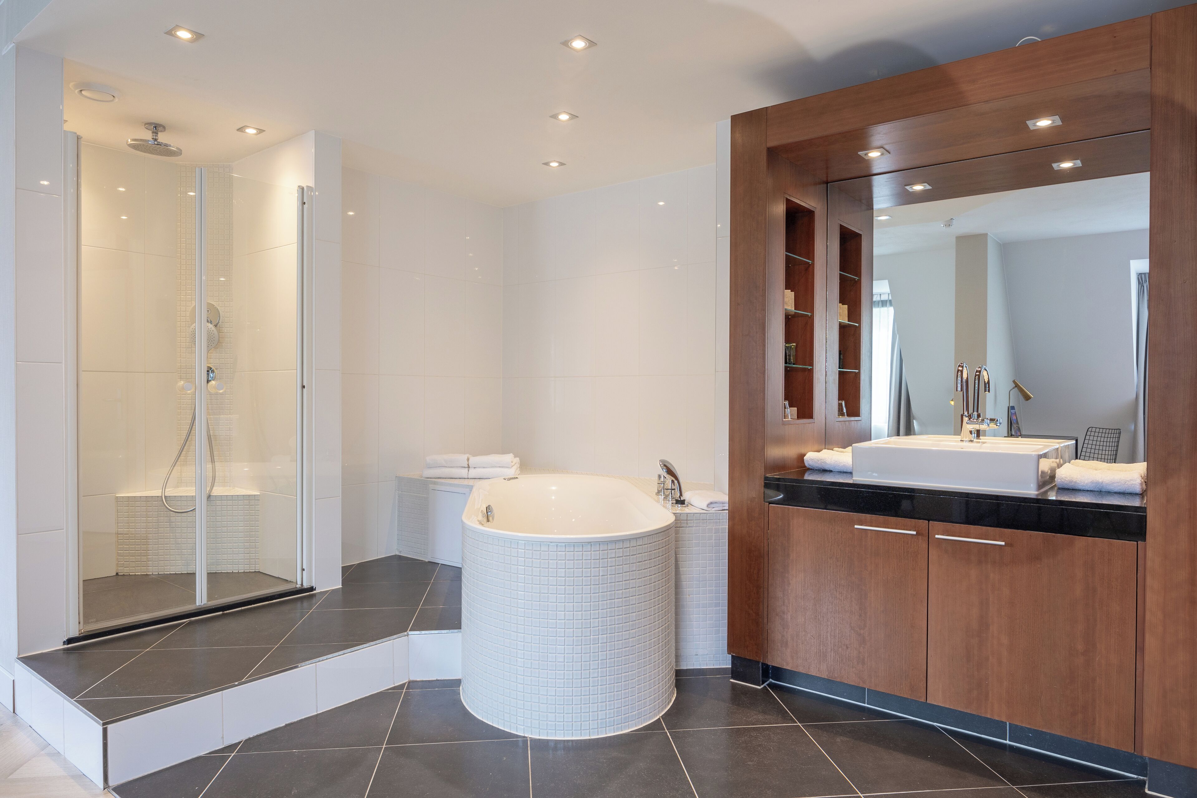 junior studio suite | bathroom | free toiletries, hair dryer, towels