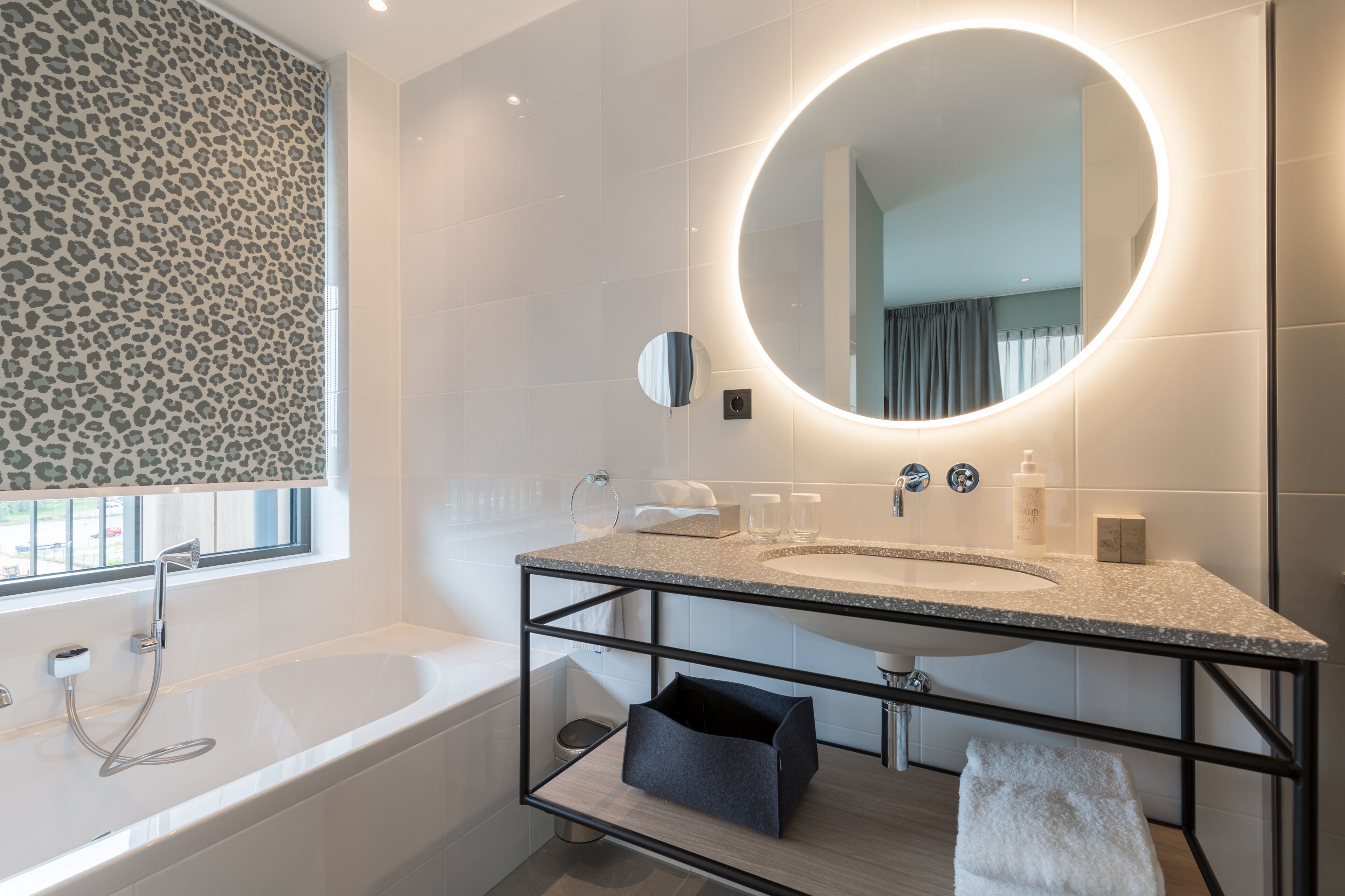 hair dryer, towels, shampoo, toilet paper