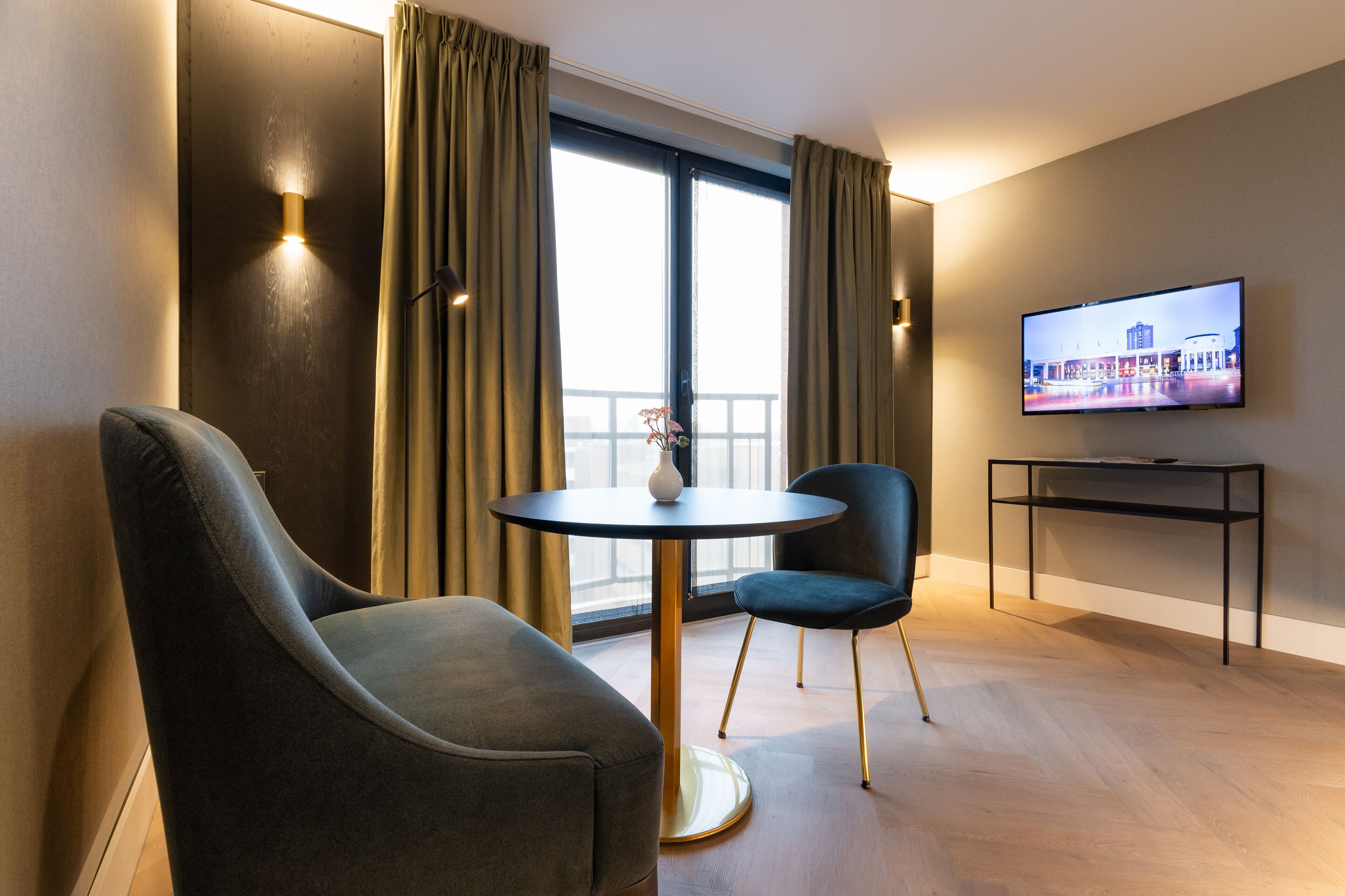 Deluxe Double Room | Living area | 40-inch Smart TV with digital channels