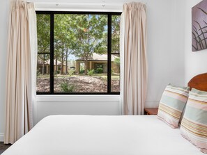 Blackout drapes, iron/ironing board, cribs/infant beds, bed sheets