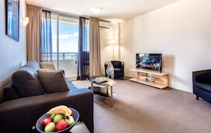 Appartement, 1 chambre, vue ville | Coin séjour