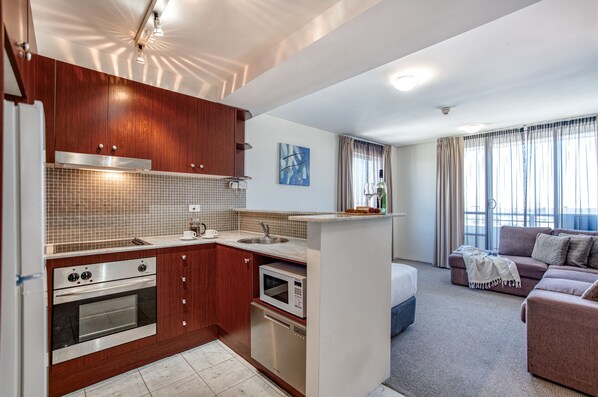 One Bedroom Apartment | Private kitchen | Fridge, microwave, oven, stovetop