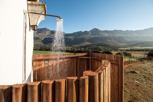 Tannie Stien's Cottage | Premium bedding, individually decorated, desk, blackout drapes