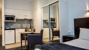 Fridge, microwave, stovetop, coffee/tea maker