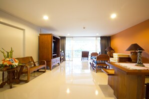 Charm Suite | Living area | 32-inch flat-screen TV with cable channels, TV - Chom View Hotel (Hua Hin)
