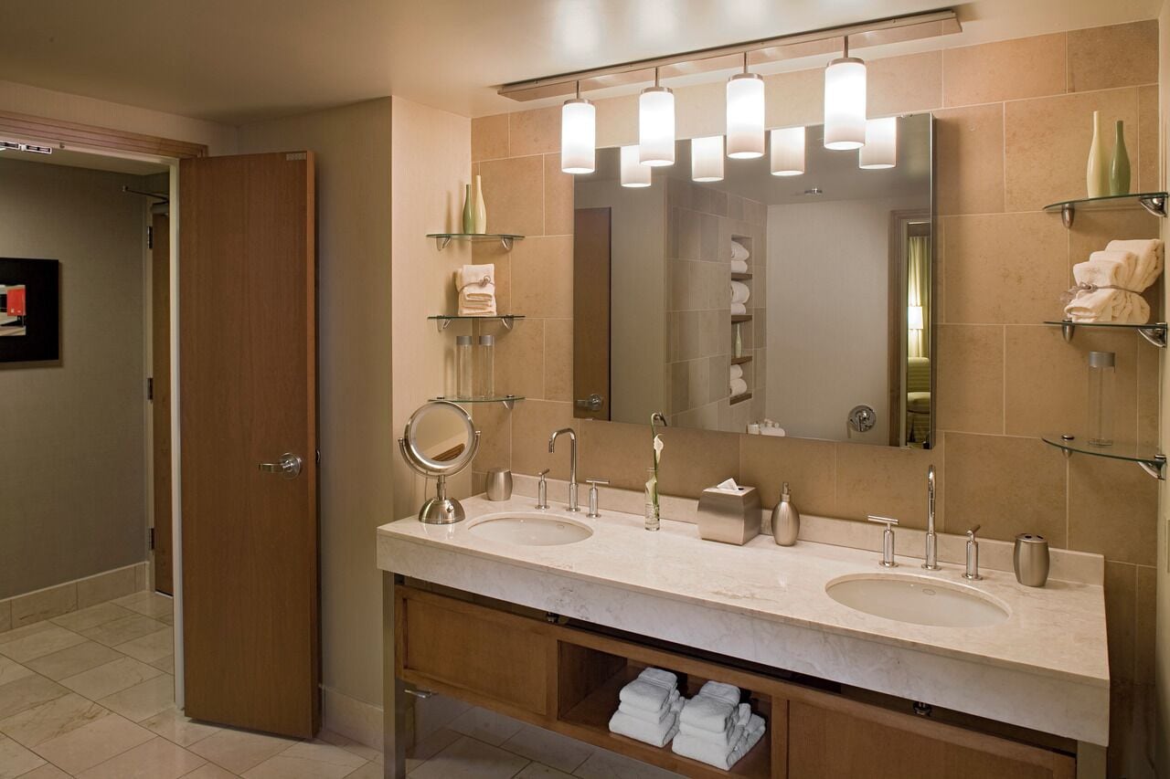 suite (monarch) | bathroom | combined shower/bathtub, designer toiletries, hair dryer, bathrobes