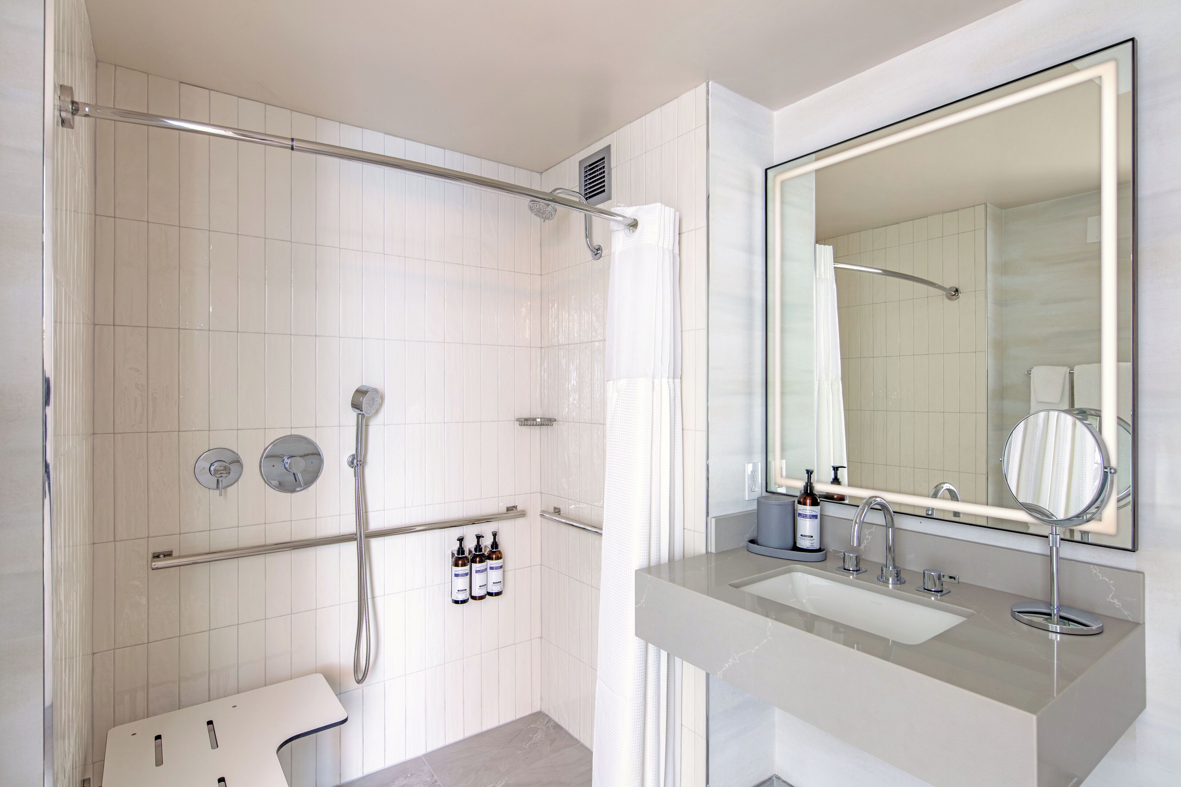 Combined shower/bathtub, designer toiletries, hair dryer, bathrobes