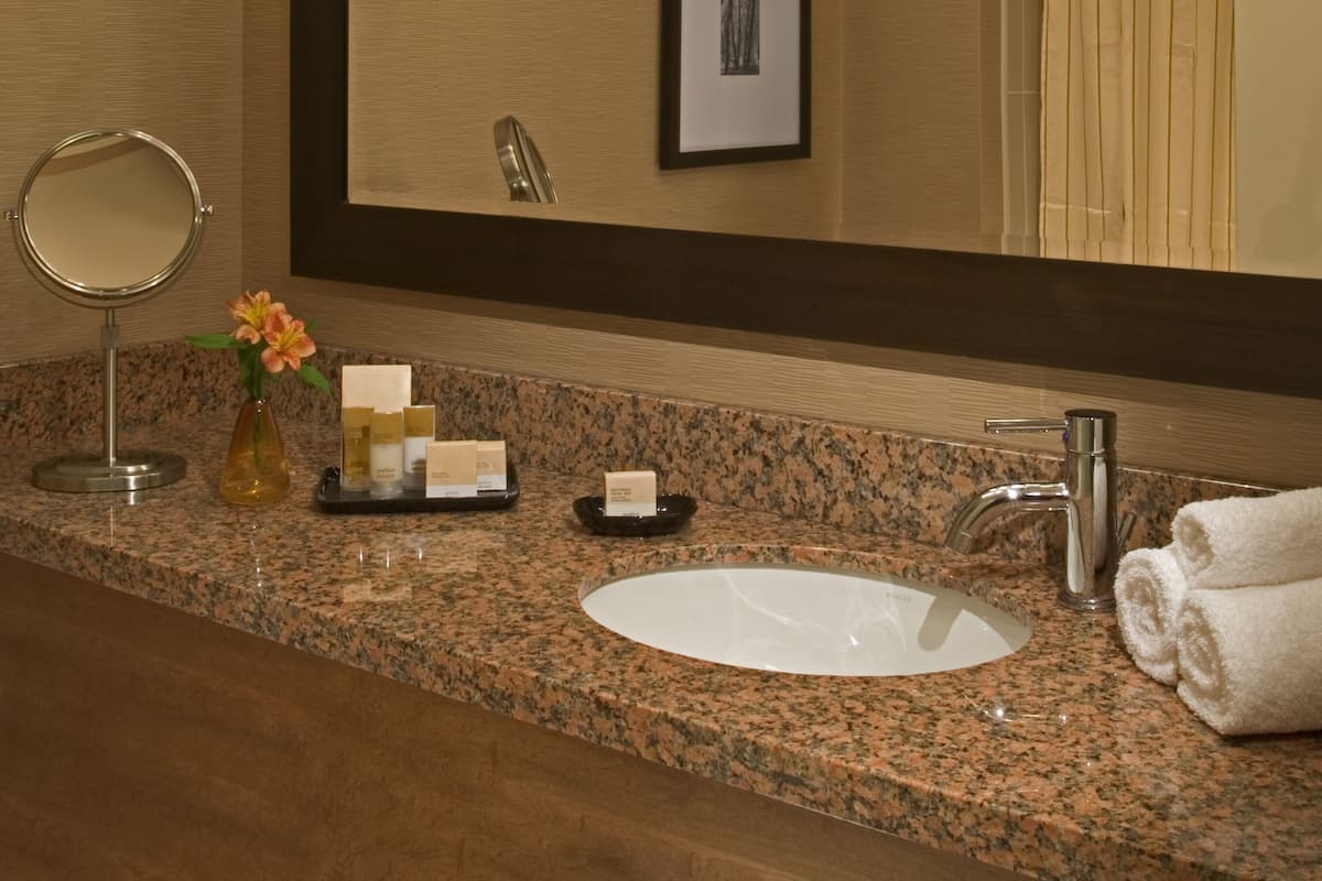 Combined shower/tub, designer toiletries, hair dryer, bathrobes