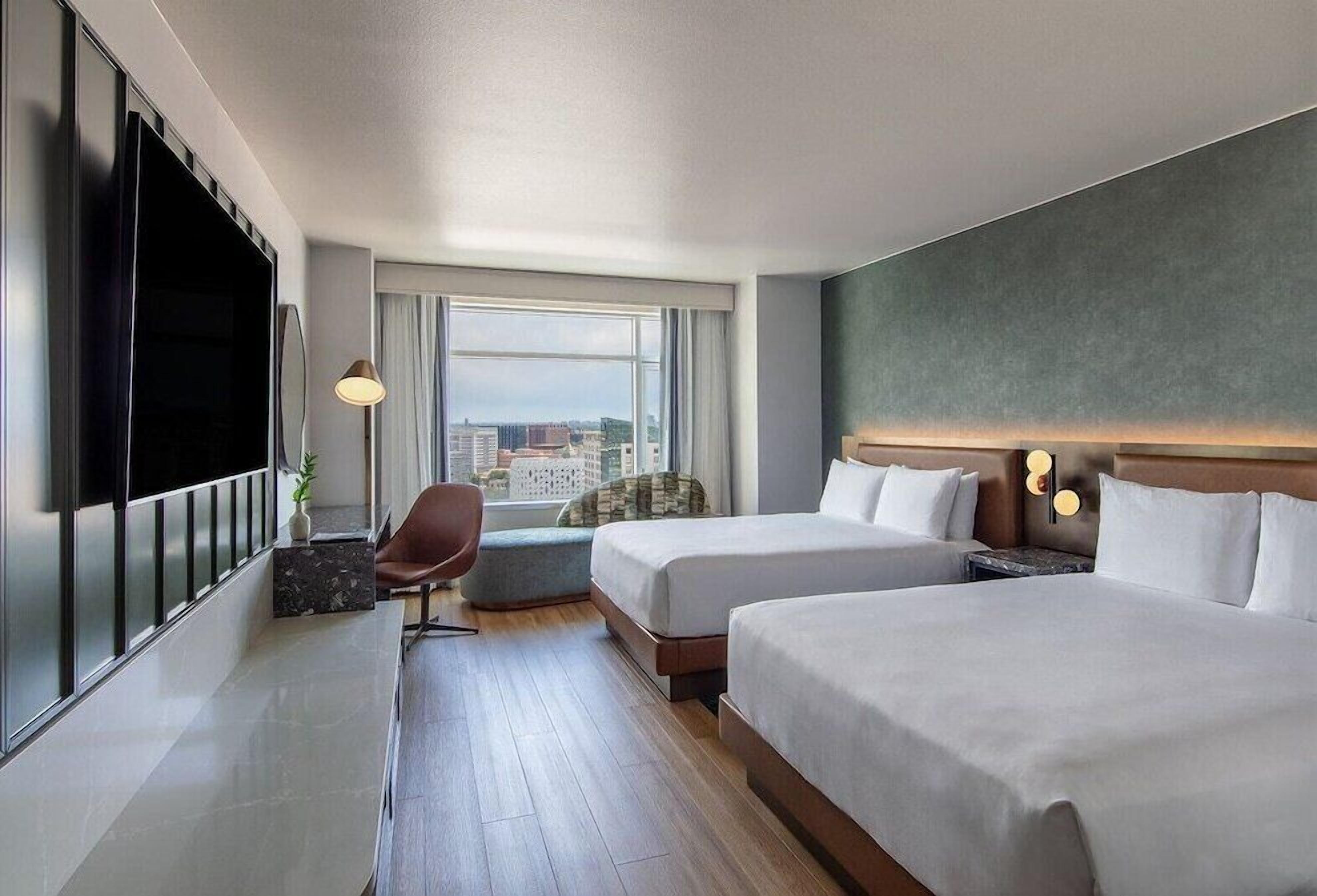 Premium bedding, pillow-top beds, in-room safe, desk