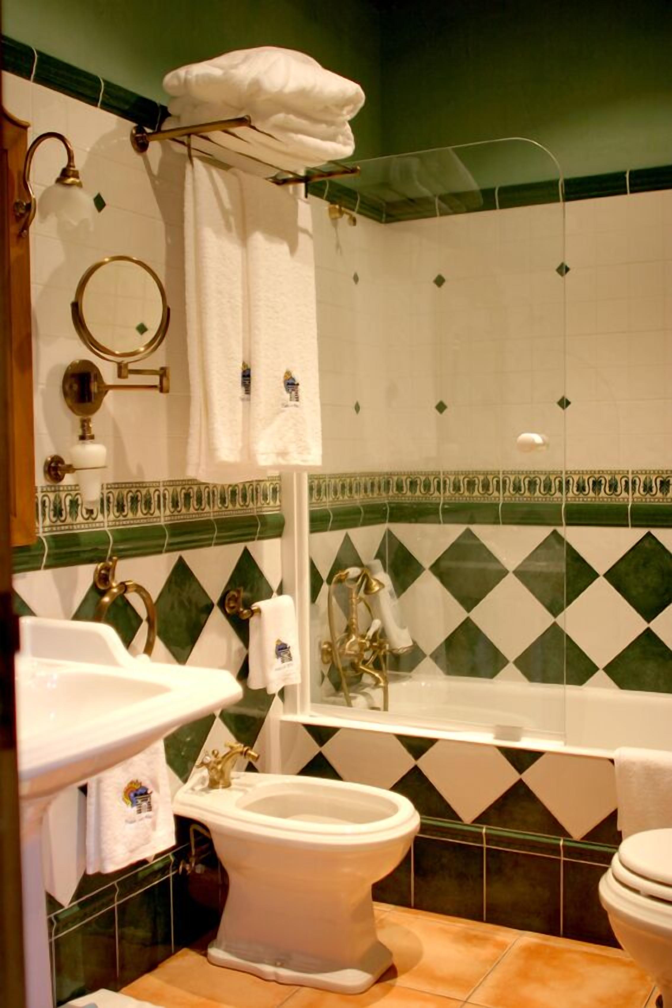 bathtub, hair dryer, towels