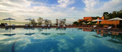 Seasonal outdoor pool, pool umbrellas, sun loungers