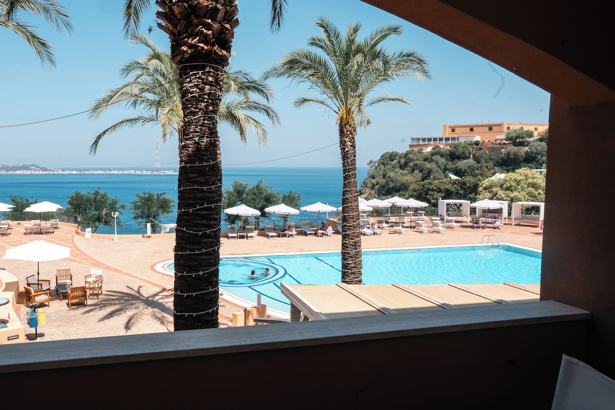 Comfort Suite, 1 Bedroom, Sea View (Quadrupla) | 1 bedroom, premium bedding, minibar, in-room safe