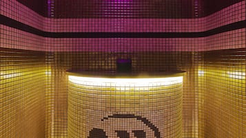 Features a unique, grid-patterned tile design and a distinctive cylindrical piece.
