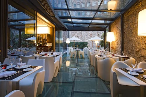 Breakfast, lunch, dinner served; Mediterranean cuisine, garden views