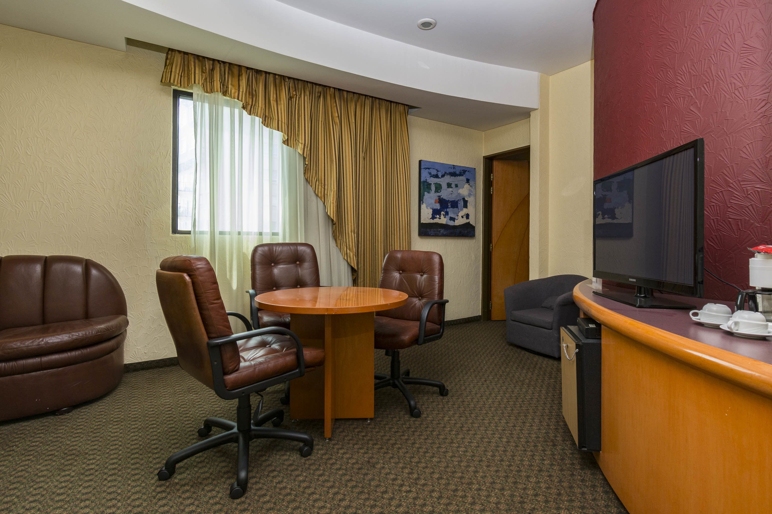 junior suite | living room | 32-inch flat-screen tv with cable channels, tv