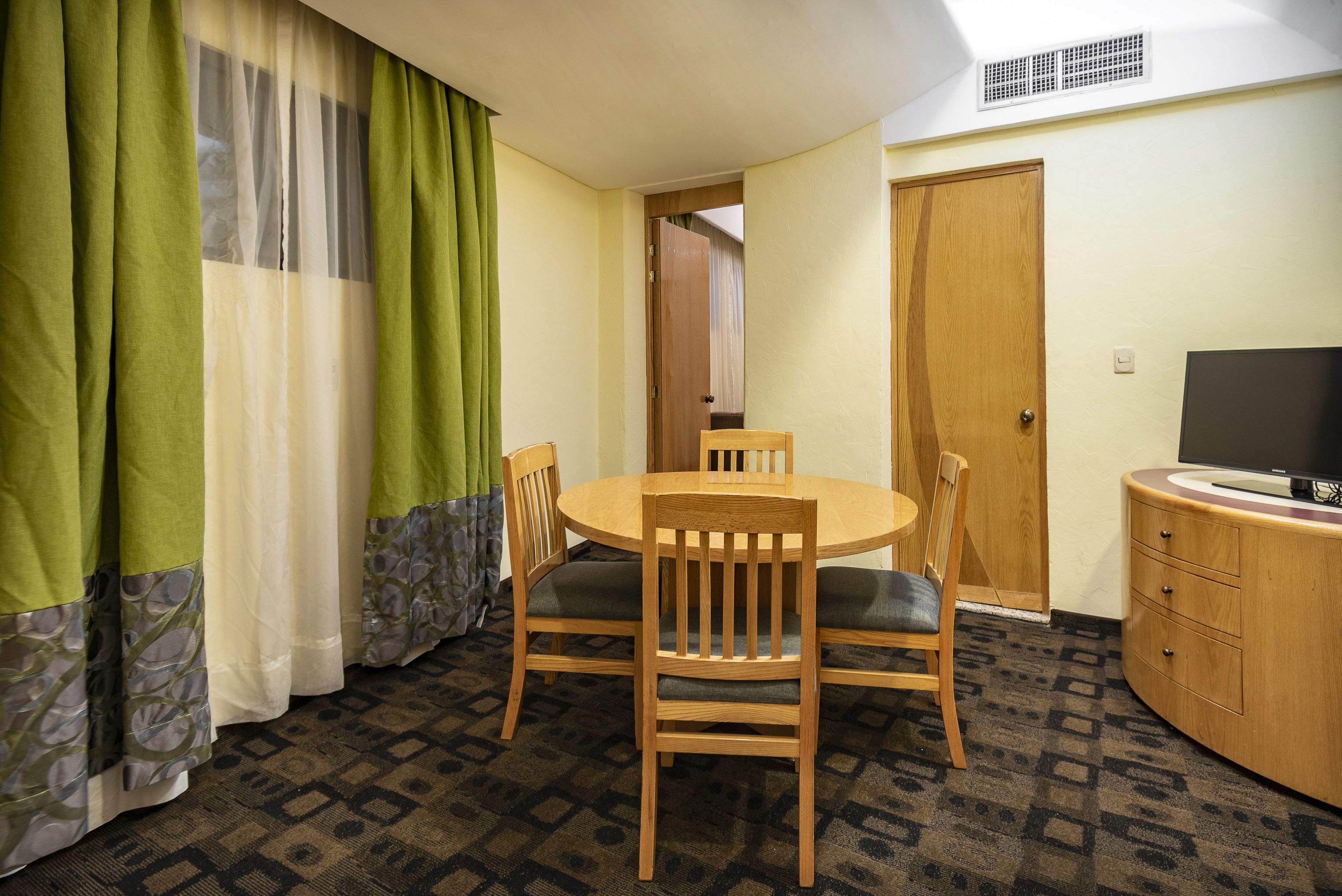 junior suite | living room | 32-inch flat-screen tv with cable channels, tv