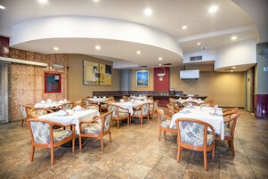 Breakfast, lunch, dinner served; international cuisine