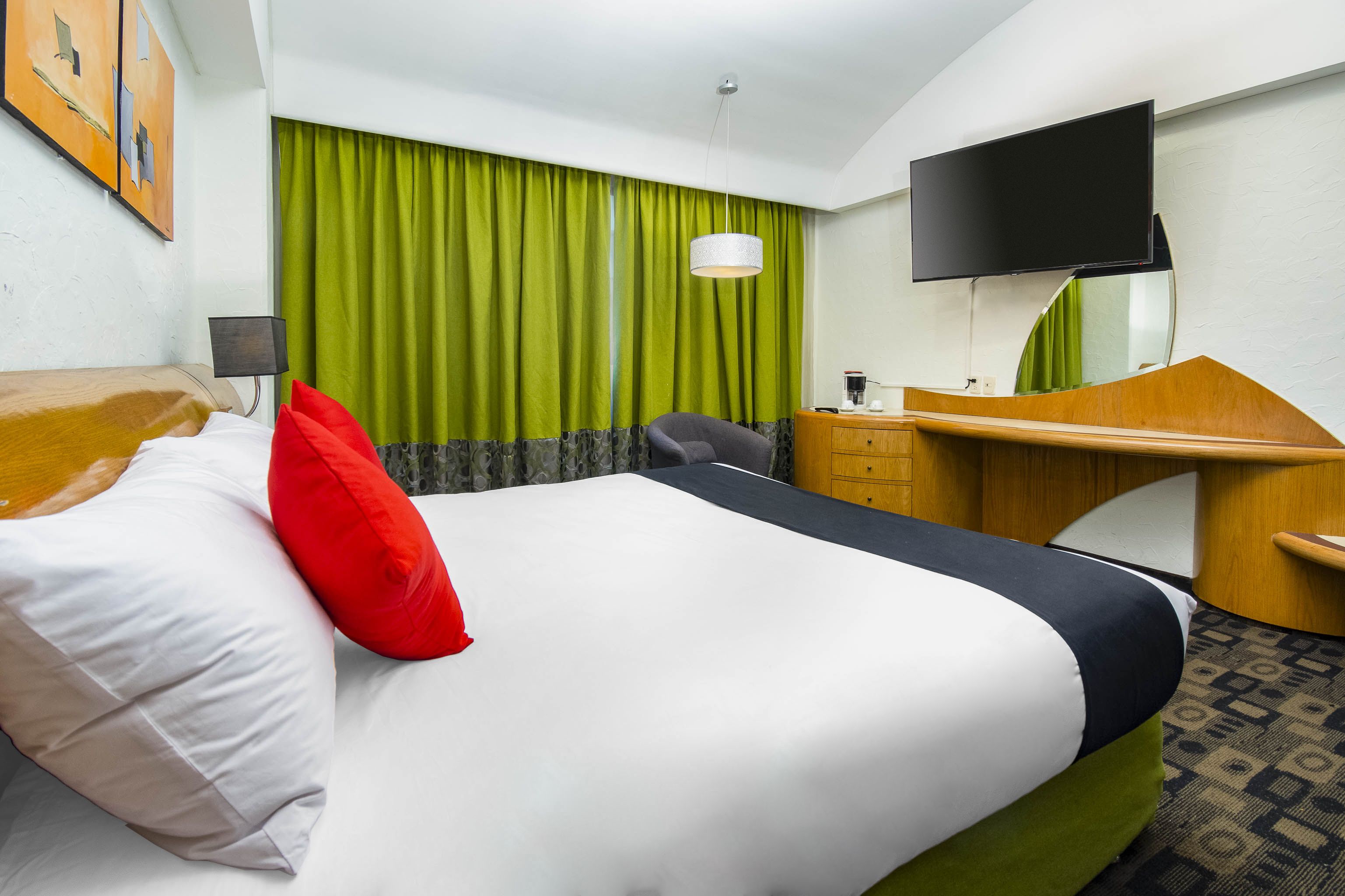 economy room | in-room safe, desk, iron/ironing board, free wifi