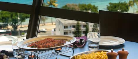 Lunch, dinner served; French cuisine, ocean views