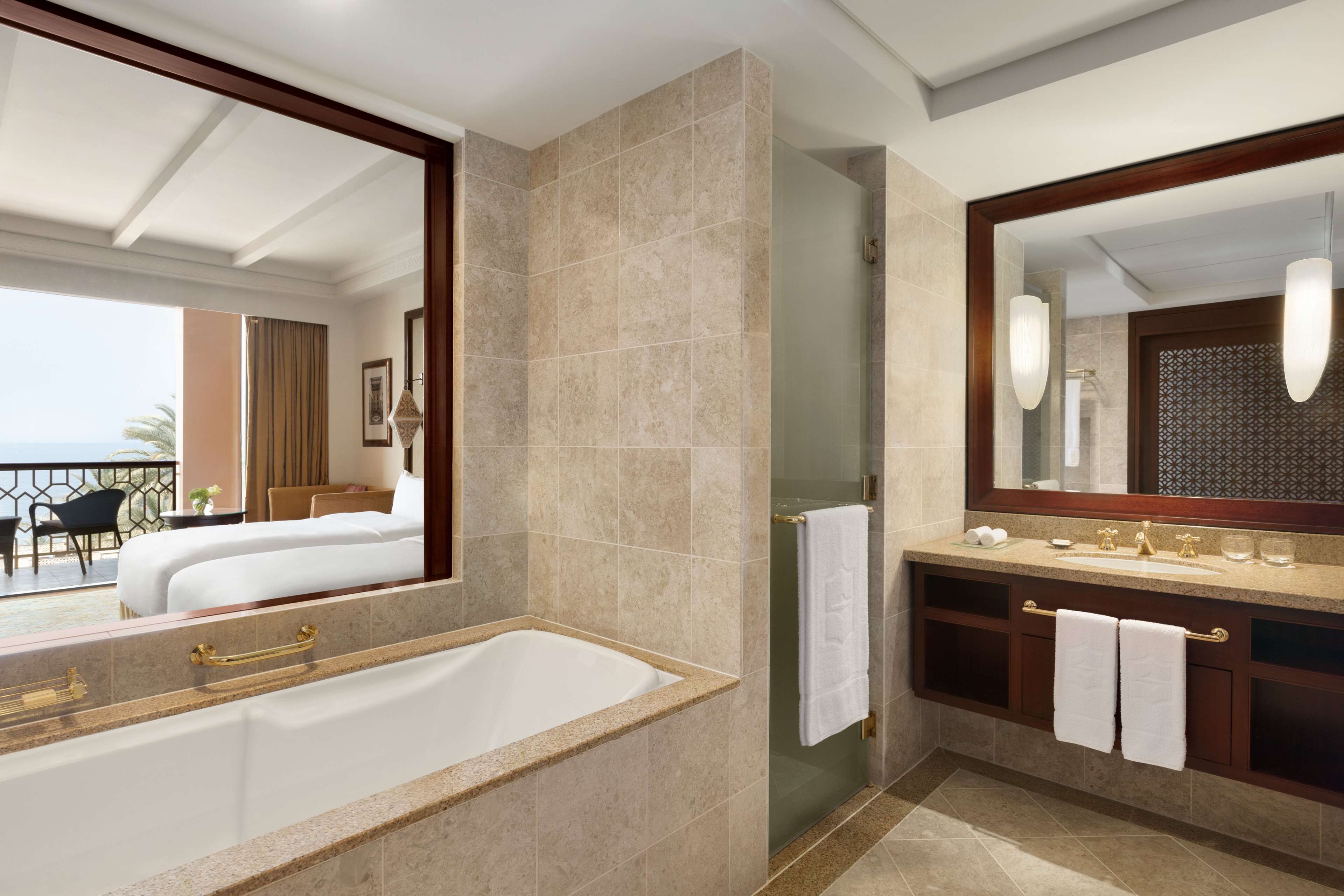 suite, 1 king bed (al bandar) | bathroom | separate bathtub and shower, deep-soaking bathtub, free toiletries