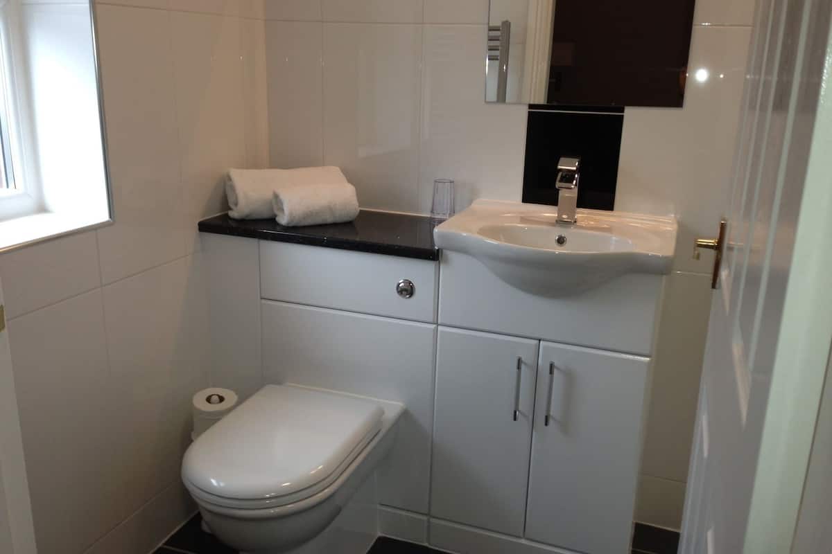 superior room | bathroom | hair dryer, towels