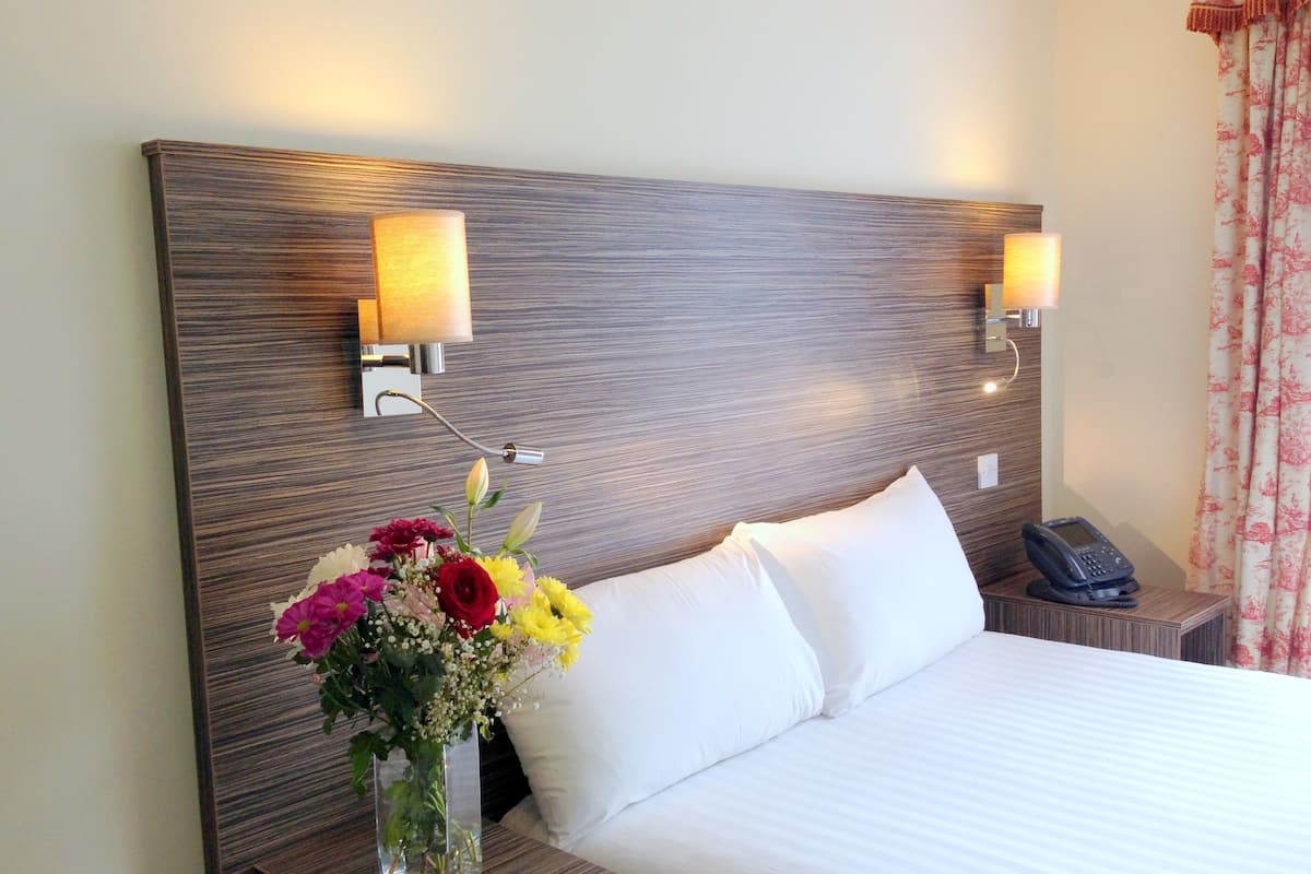 Standard Double Room | Pillowtop beds, individually decorated, desk, iron/ironing board