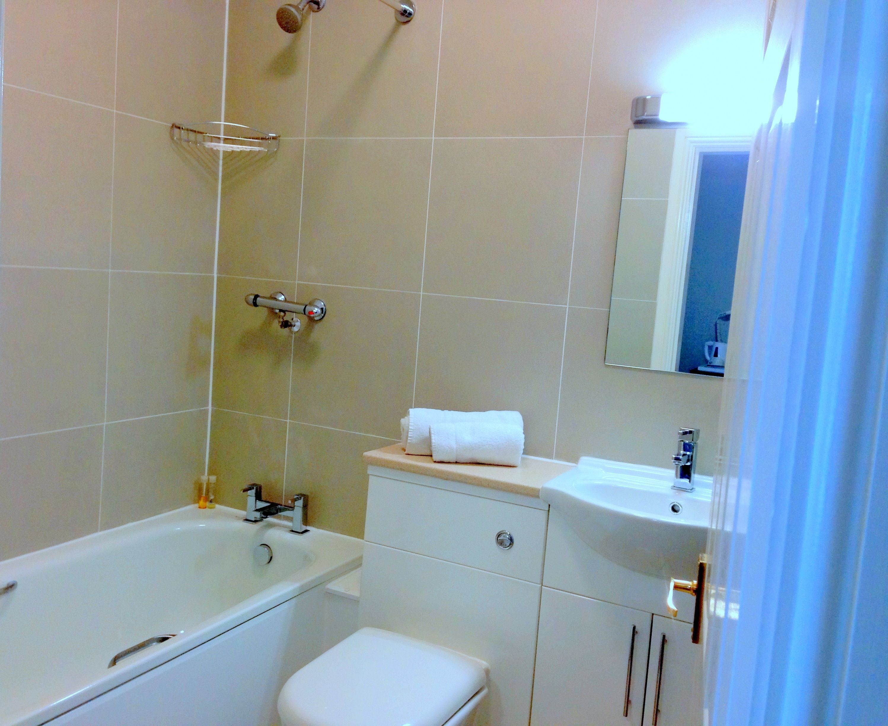 superior room | bathroom | hair dryer, towels