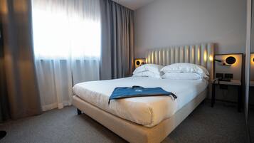 In-room safe, desk, blackout curtains, soundproofing