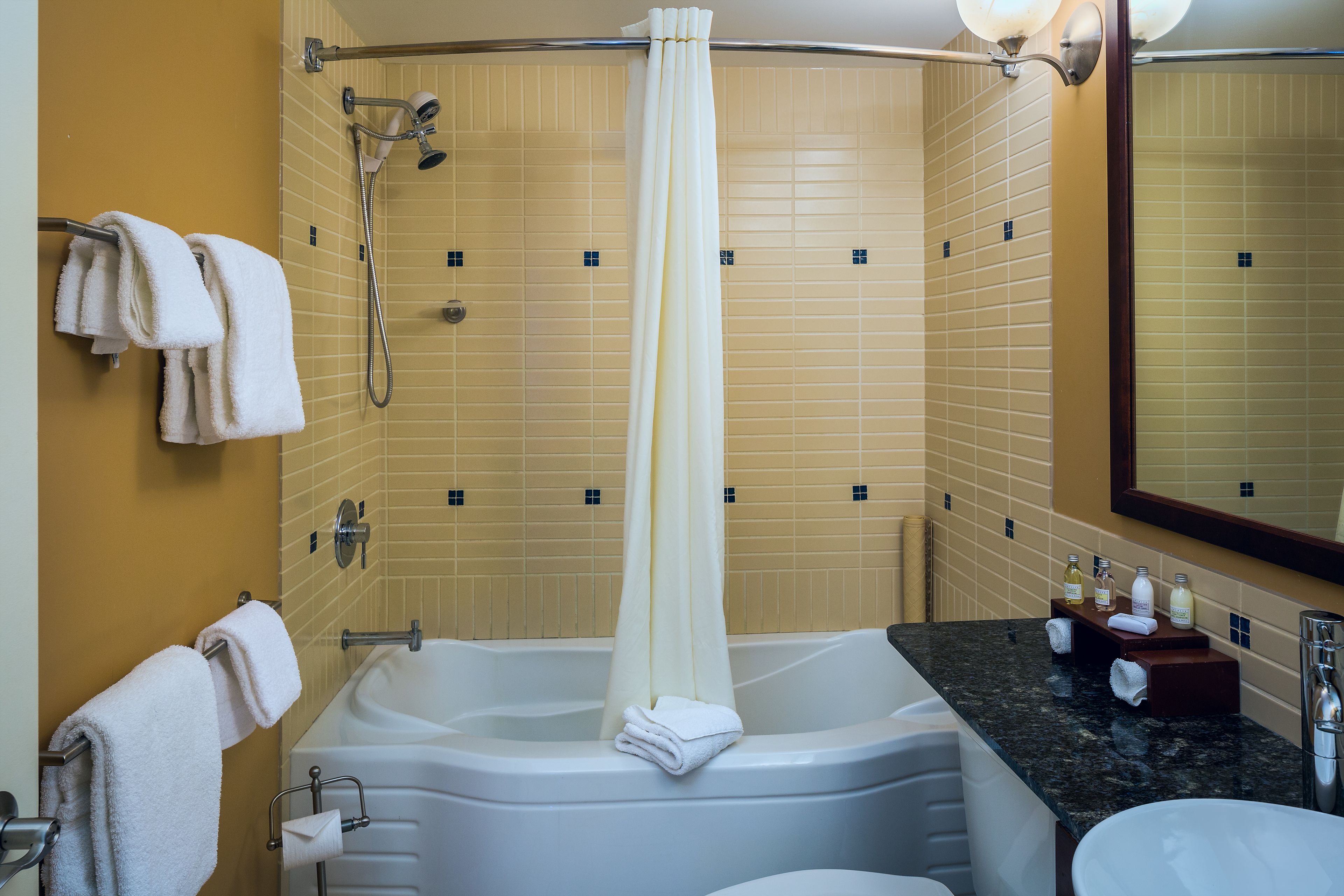 combined shower/bathtub, deep-soaking bathtub, eco-friendly toiletries