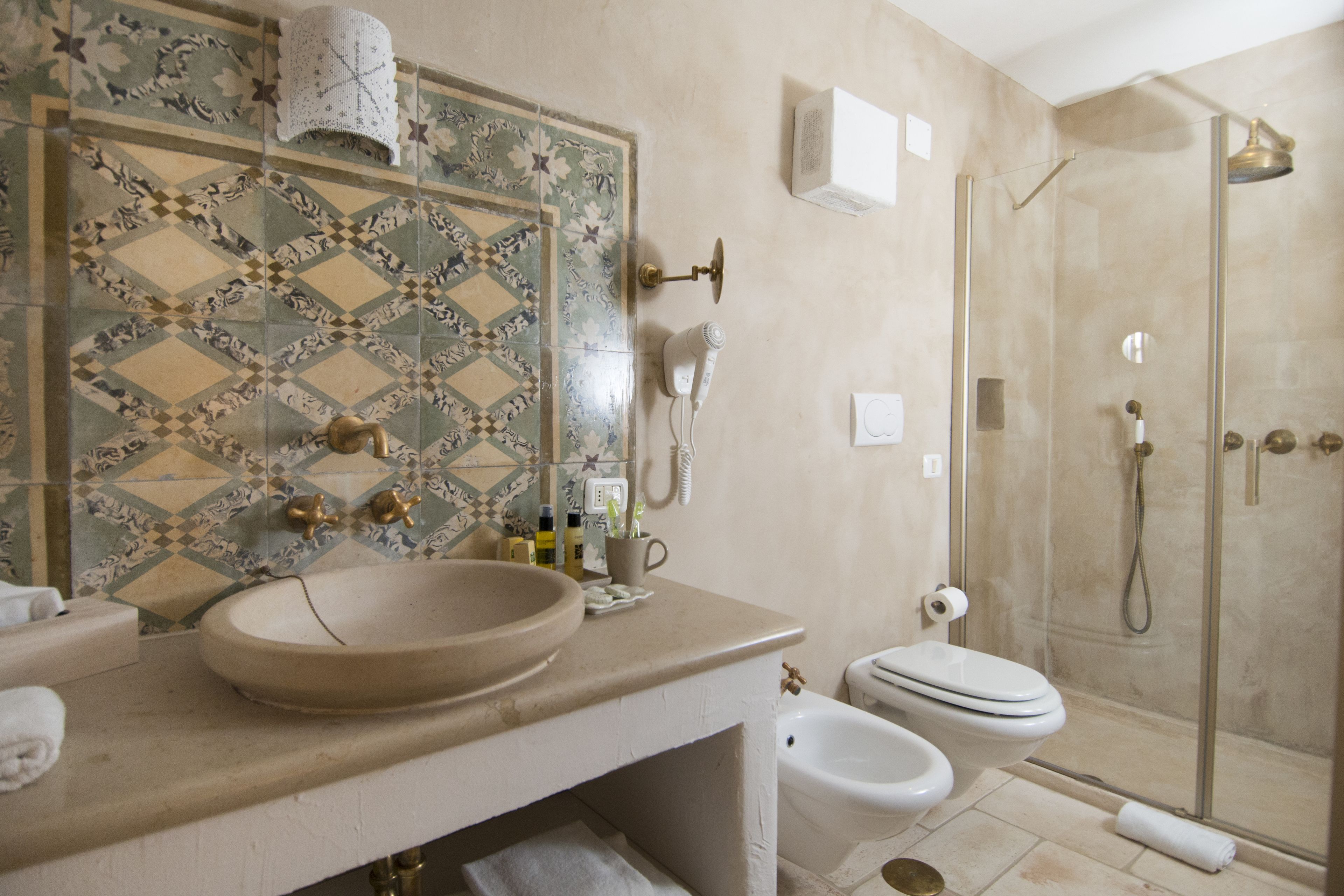 superior triple room, 1 bedroom, ensuite, garden area | bathroom | free toiletries, hair dryer, bathrobes, slippers