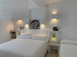 迷你吧、遮光窗帘、免费 WiFi、床单