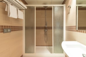 Secador de pelo y toallas