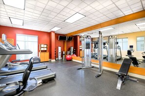 Stay active with our fully equipped gym featuring treadmills, weight machines, and exercise balls.