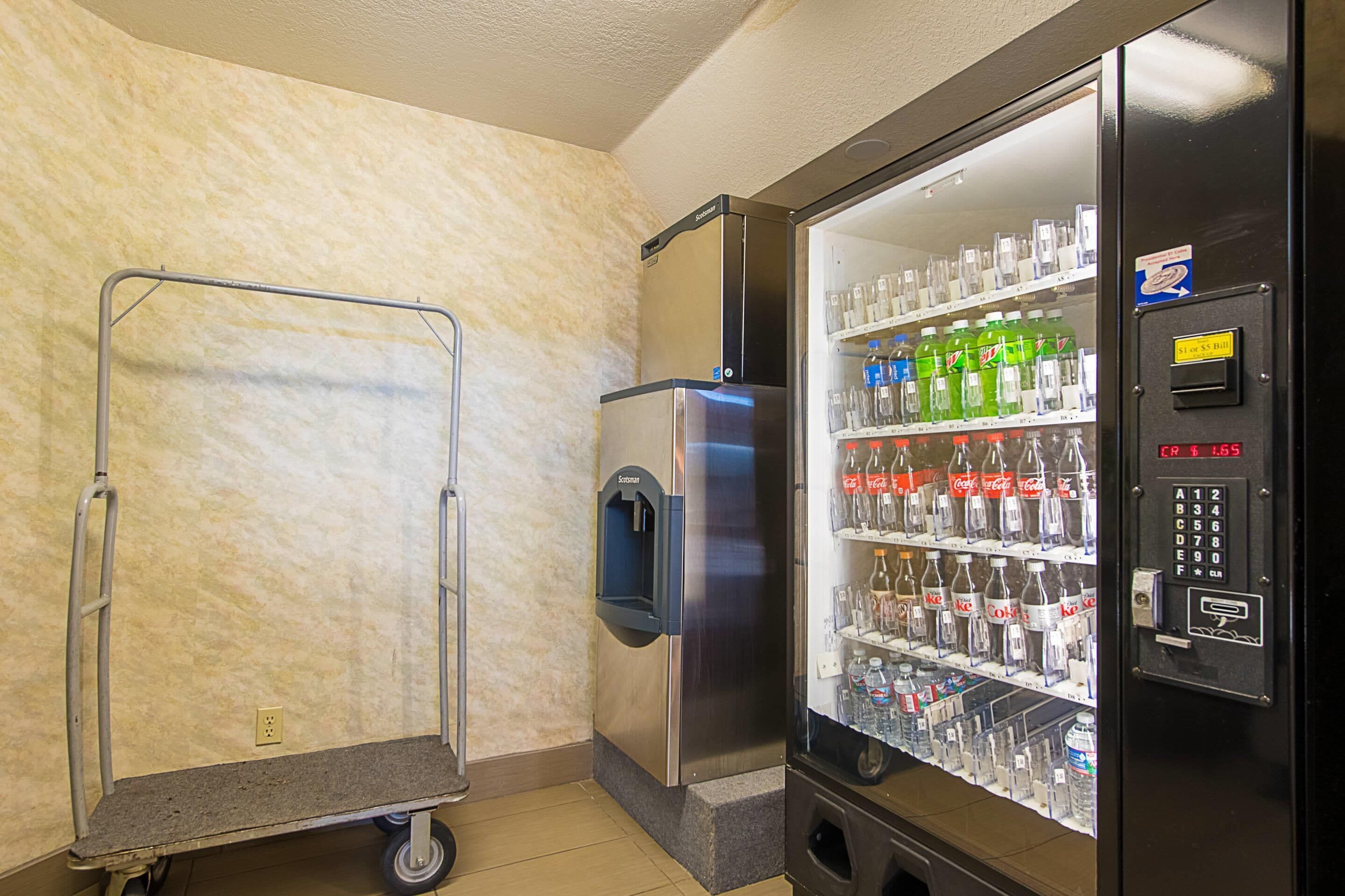 A vending machine with a variety of beverages and a refrigerated display case.