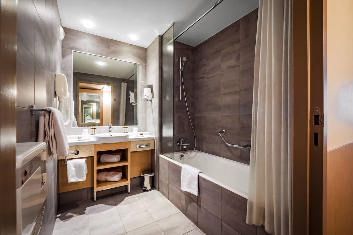 hair dryer, dressing gowns, slippers, towels