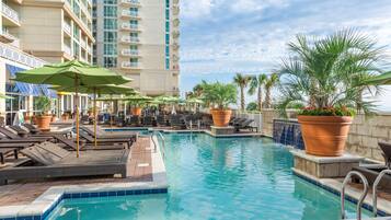 2 indoor pools, outdoor pool, open 8:00 AM to 10:00 PM, pool umbrellas