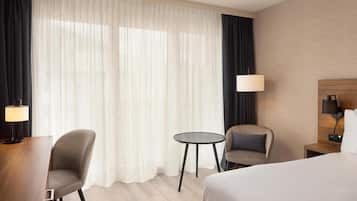 Suite junior, 1 cama de matrimonio grande | Colchones Select Comfort, caja fuerte, escritorio