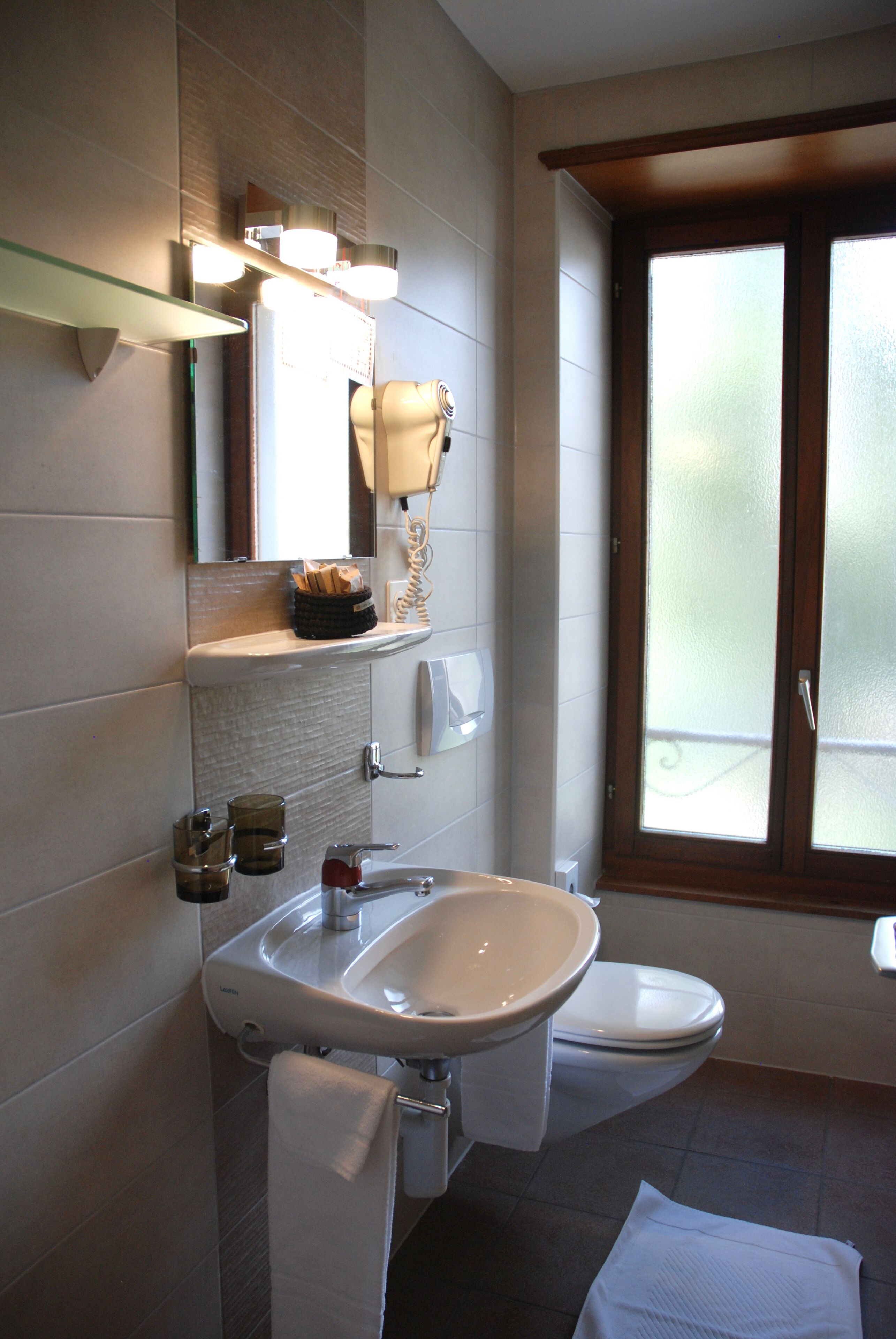 superior double room | bathroom | shower, free toiletries, hair dryer, towels