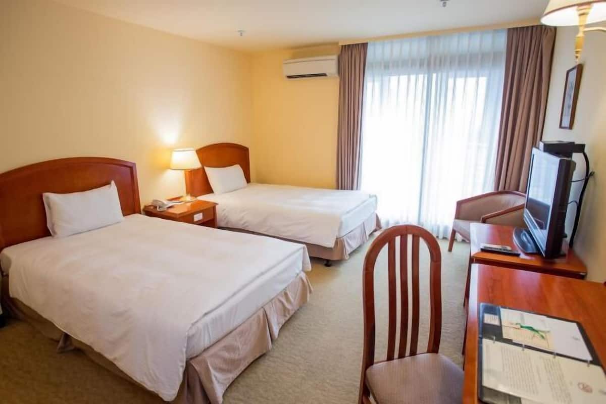 Premium bedding, down duvets, pillow-top beds, minibar