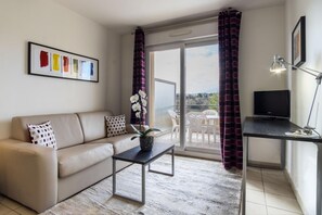 Classic Apartment, 1 Bedroom | Living room | 20-inch flat-screen TV with cable channels, TV - Nemea Appart Hotel Green Side Biot Sophia Antipolis (Biot)