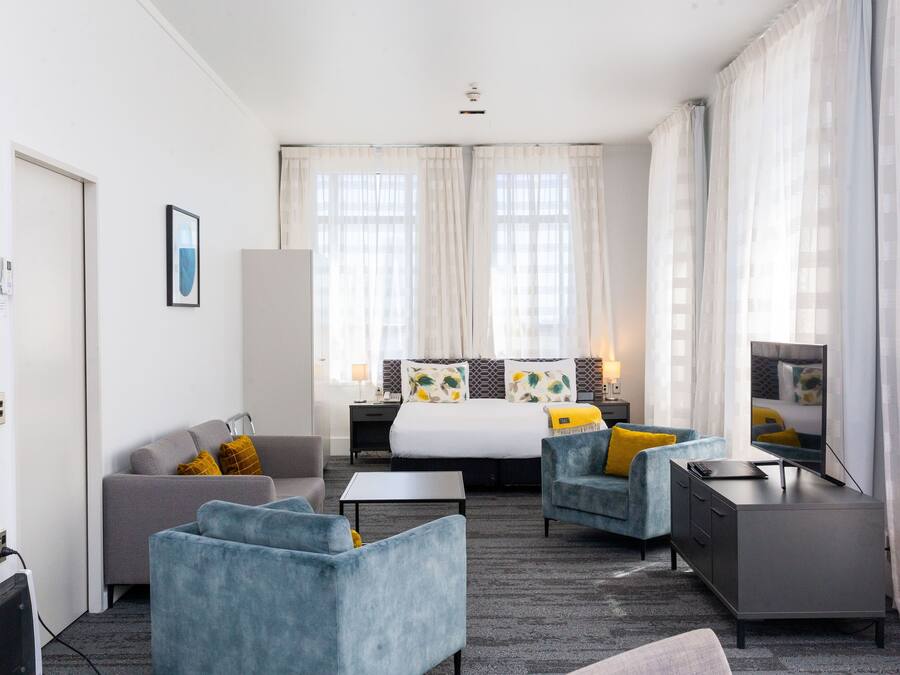 Premium bedding, desk, blackout curtains, iron/ironing board