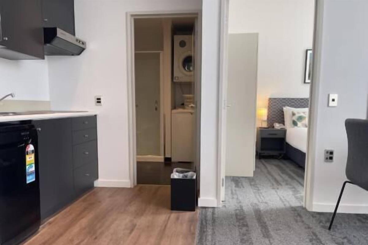 Premium bedding, desk, blackout curtains, iron/ironing board