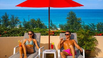 Outdoor pool, pool umbrellas, pool loungers