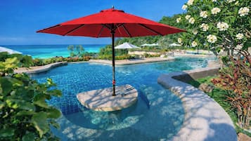 Outdoor pool, pool umbrellas, sun loungers