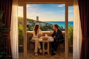 Estudi en suite executiu, 1 llit de matrimoni gran, vistes a l'oceà | Vista de la platja o del mar