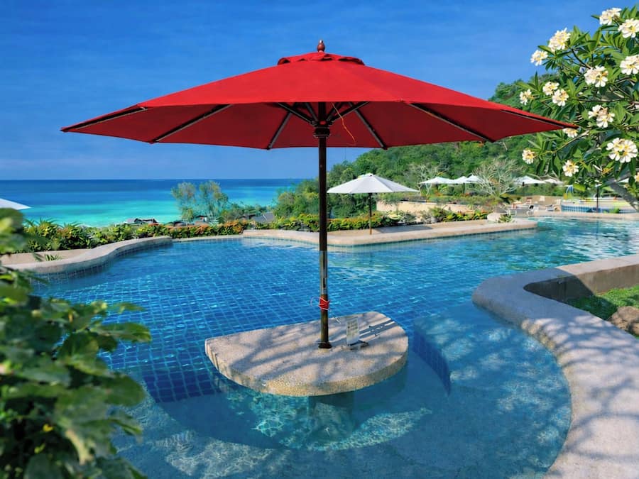 Outdoor pool, pool umbrellas, sun loungers