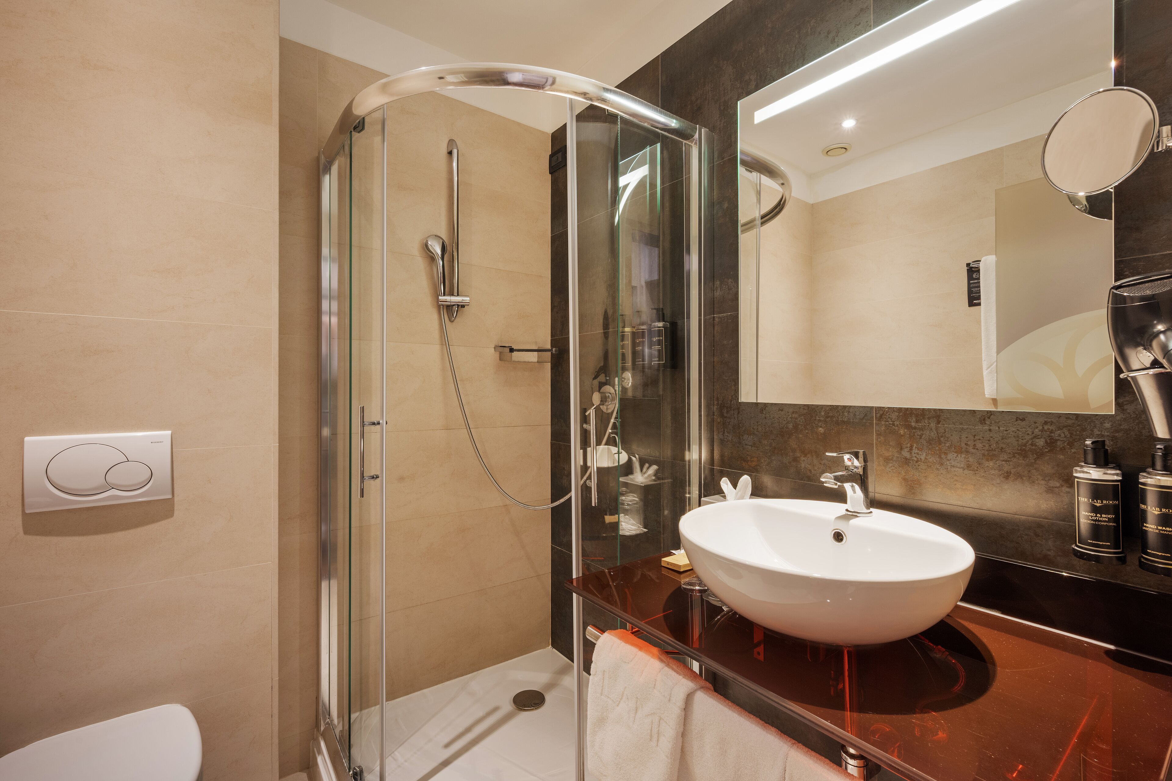 rainfall showerhead, designer toiletries, hair dryer, bidet