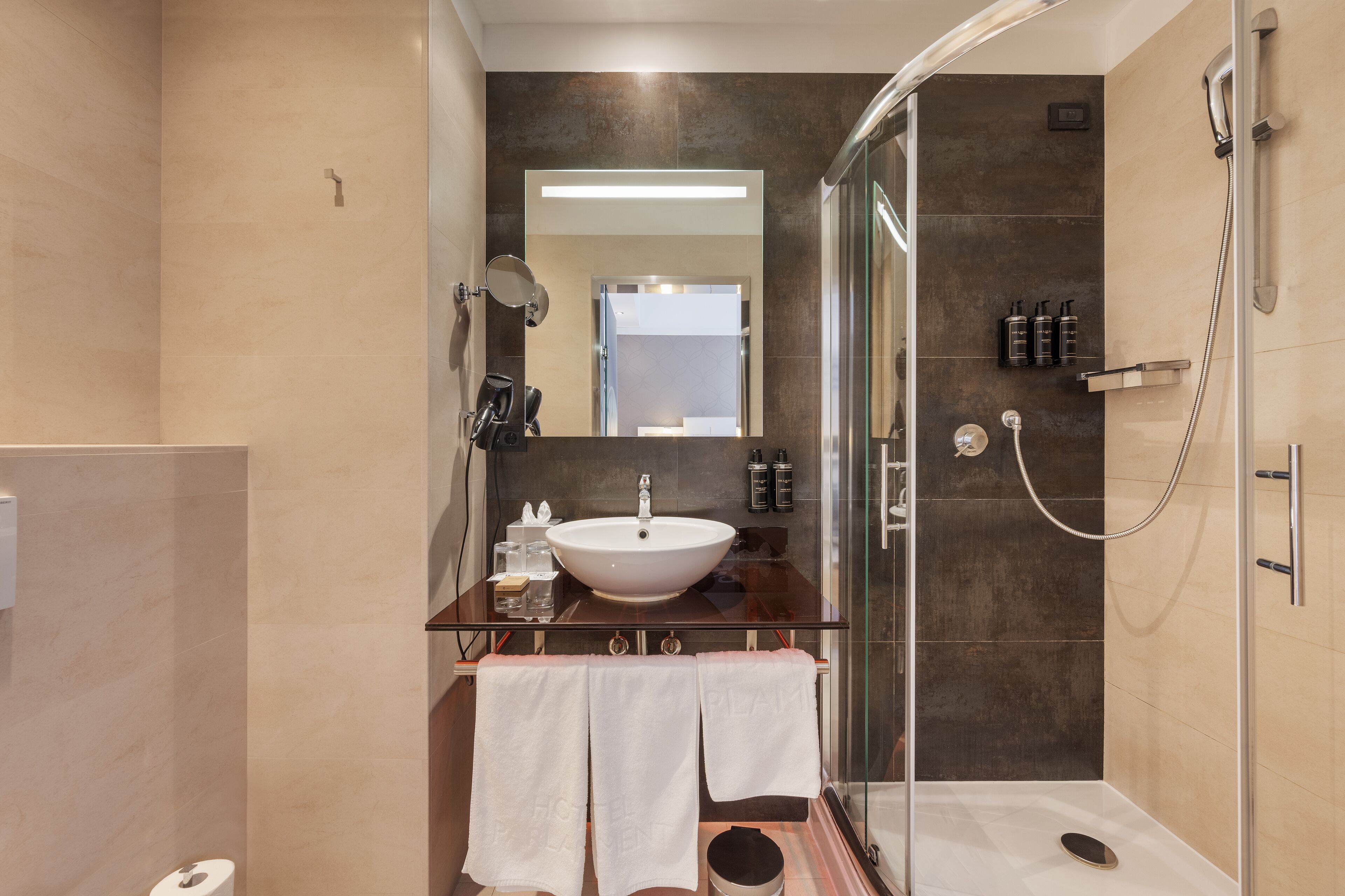 deluxe room (superior) | bathroom | rainfall showerhead, designer toiletries, hair dryer, bidet
