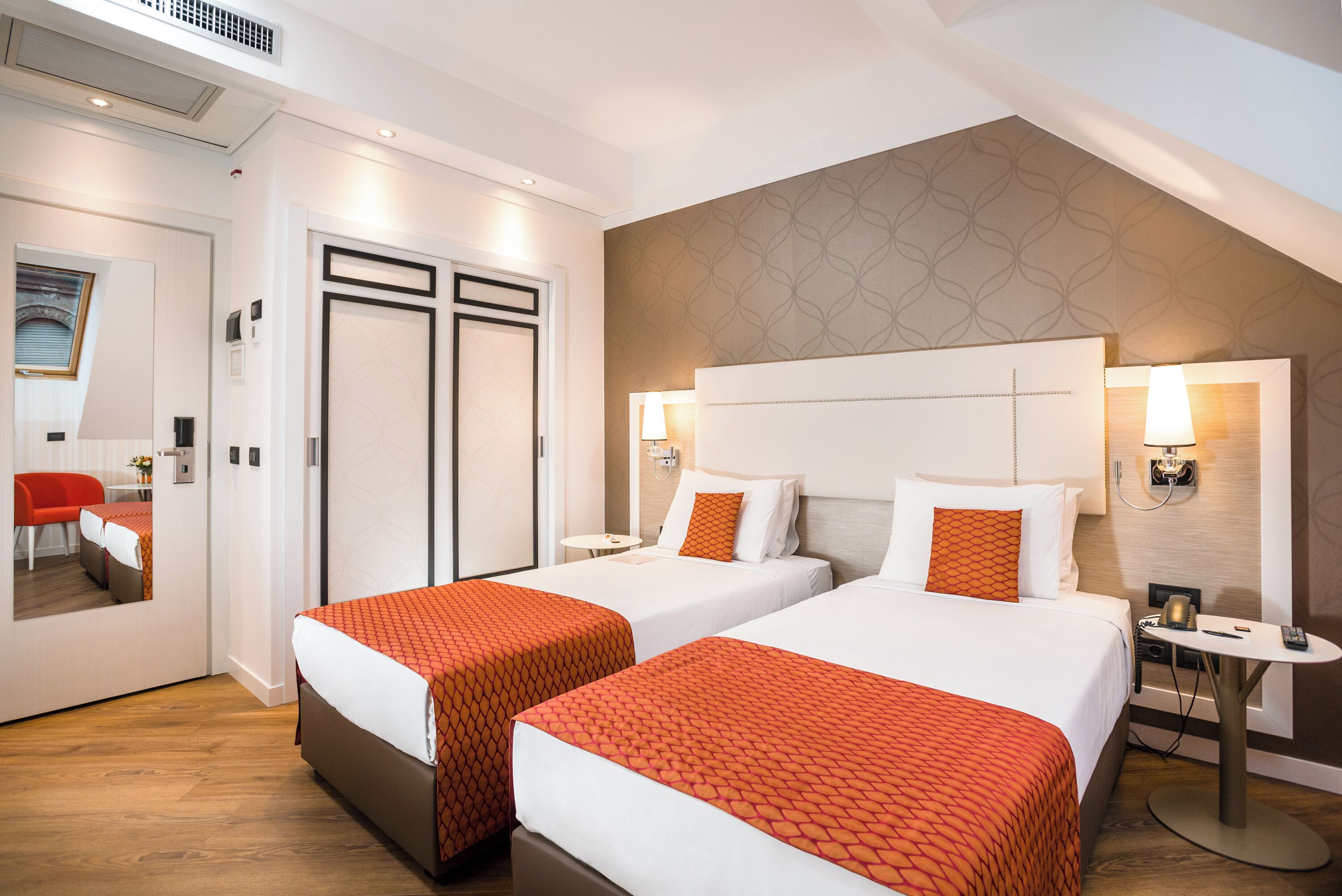Premium bedding, memory-foam beds, minibar, in-room safe